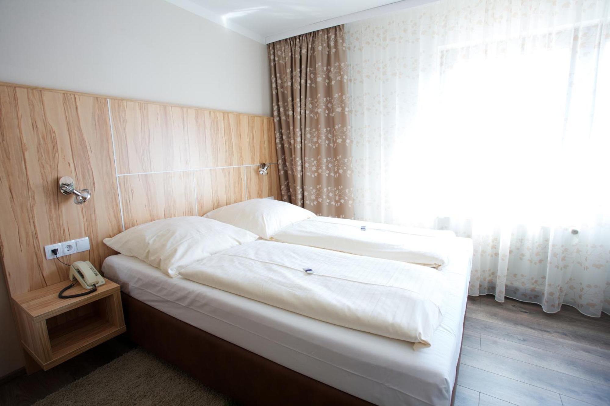 Hotel Reinhardtshof Garni Wolfschlugen Номер фото
